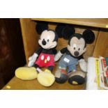 Two Mickey Mouse soft toys