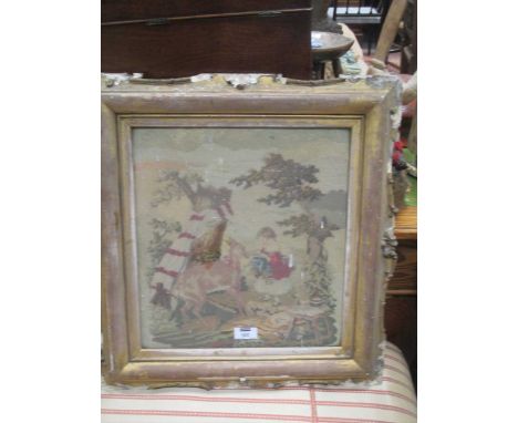 A Victorian woolwork picture of a young girl feeding a deer, an early 19th century sampler and a Belgian tapestry 20 fire scr