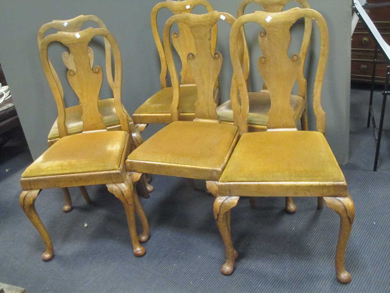 A set of six II faded mahogany dining chairs and an oak