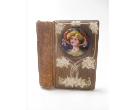 An Arts &amp; Crafts Birth-Day Book, perhaps Birmingham School of Art circa 1900-1910, with enamelled roundel to the oak cove