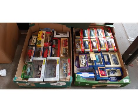 32 boxed model vehicles including Burago, Dinky, Matchbox etc. 