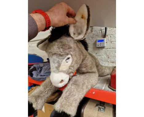 A large Steiff donkey, Molly Esel, with button &amp; tags. 