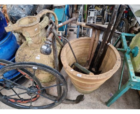 A very large stoneware planter and a very large urn 