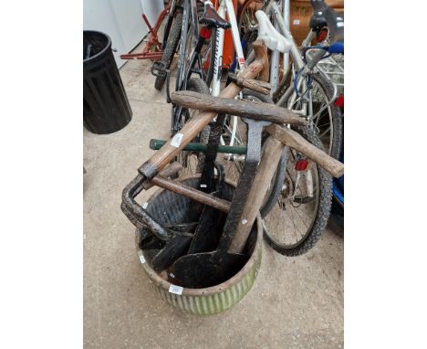 A selection of vintage farming tools including Silage Cutter, Antique Ice Saw Hay Knife, A Turfing Spade etc 