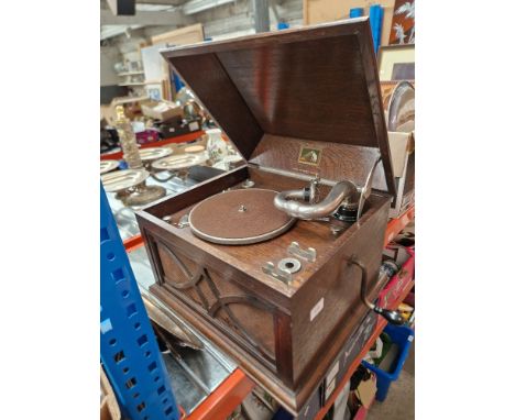 A vintage HMV 104 oak table top gramophoneCondition:- Good, winder works, untested for sound.