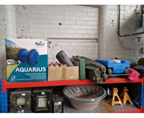 A quantity of camping including an Aquarius fresh water roller, camping gas stove with extra cartridges, a cased cutlery/BBQ 