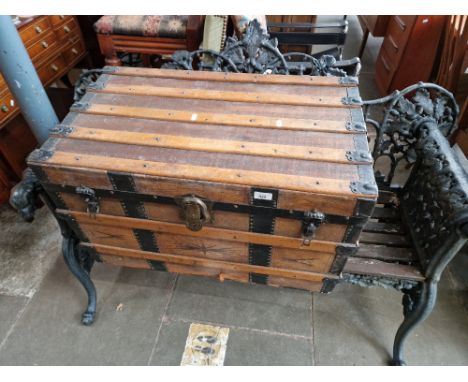 A vintage leather bound travel trunk. 