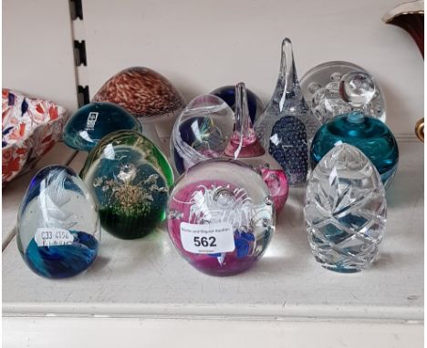 12 glass paperweights including Caithness, Mdina, Wedgwood Glass etc. 