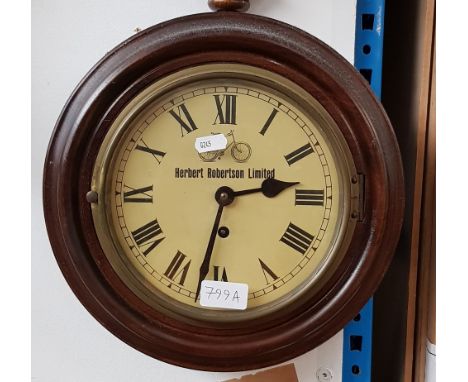 Vintage wall clock, the dial marked 'Herbert Robertson Limited' with an image of a bicycle. 