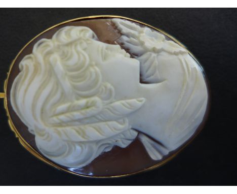 An 18ct yellow gold mounted Cameo brooch, decorated with a head and shoulder portrait of a young lady