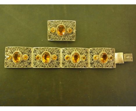 An Indian filigree silver (800) bangle and matching brooch bangle - Diameter approx. 6cm - Total weight approx. 1.2 troy ozCo