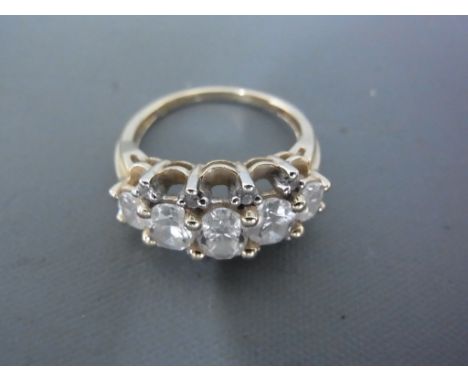 A 14ct yellow gold dress ring set with cubic zirconia to shoulder - ring size K - approx weight 3.6 grams - good condition