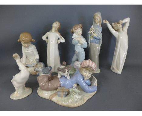 Five Lladro figures and two Nao figures including number 5451 etc - in good condition