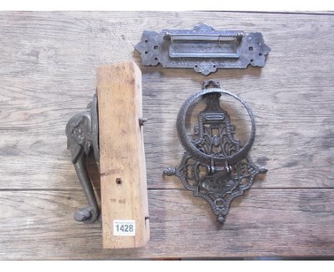 An elephants head cast iron door knocker - Height 25cm - a folding cast iron pot holder and a Kenrick and Sons No 7 door lett