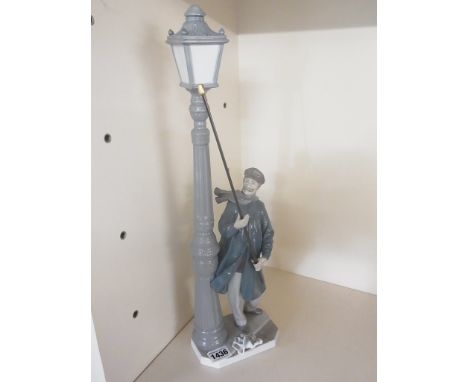 A Lladro figure lamp lighter - good condition