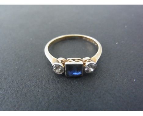 An 18ct yellow gold and platinum sapphire and diamond ring size K/L - approx 2 grams - stones good minor wear, marked 18ct Pl