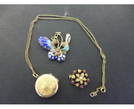 An enamel and yellow metal pendant in the form of a butterfly, a yellow metal, seed pearl and ruby floral design pendant, a y