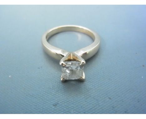 An 18ct yellow gold and diamond ring, the princess cut diamond being 1.2ct in size - approx colour J-K - clarity P - ring siz