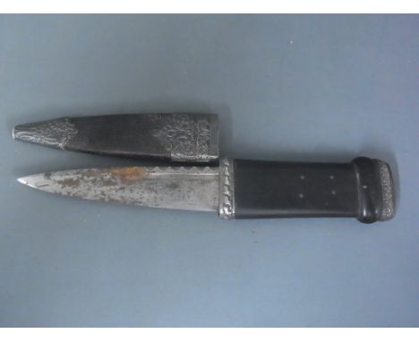 A Scottish Skean Dhu - the scabbard marked R & RB Kirkwood 66 to 68 Thistle Street, Edinburgh - blade has rusty area to one s