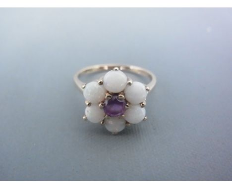 A 9ct amethyst and opal nine-stone cluster ring - Size P - in good condition - approx weight 2.6 grams