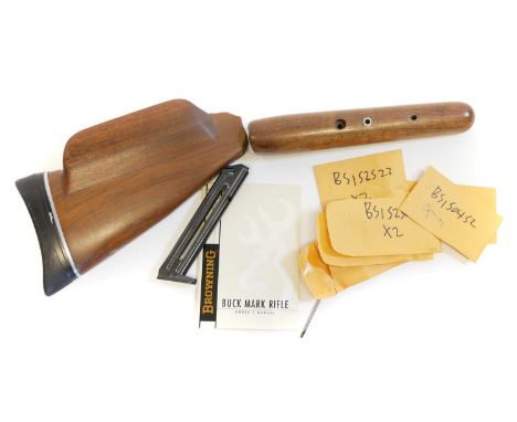 Browning Buckmark parts Browning Buckmark parts, to include a spare magazine, wood stock and forend, instruction book, and pa
