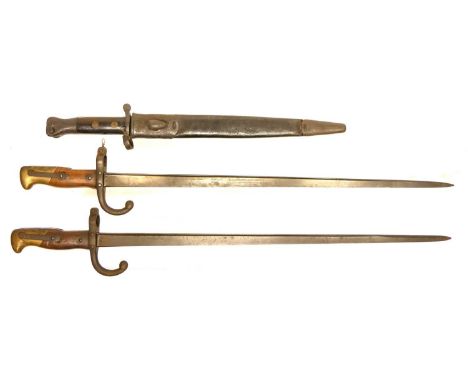 1888 pattern bayonet and scabbard and two Grass 1876 bayonets 1888 pattern bayonet and scabbard, the ricasso stamped Wilkinso