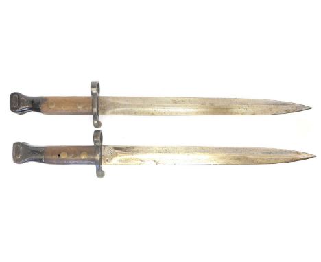Two 1888 pattern bayonets Two 1888 pattern bayonets, one by Mole dated 3,00, the other by Wilkinson dated 7,97. Buyer must be