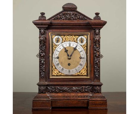 A Winterhalder &amp; Hofmeier oak bracket or table clock, the rectangular brass dial with silvered Roman chapter ring, Arabic