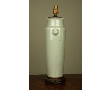 A celadon glazed table lamp of tapering cylindrical form decorated with lion masks and with turned wooden base, 12cm diameter