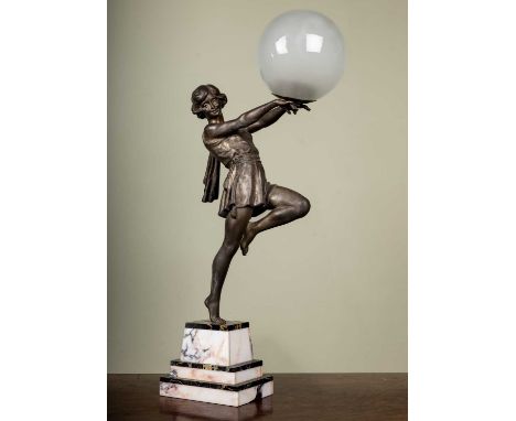 Emile Carlier of France, an Art Deco table lamp of a girl supporting a glass ball all on a stepped marble plinth base, the gi