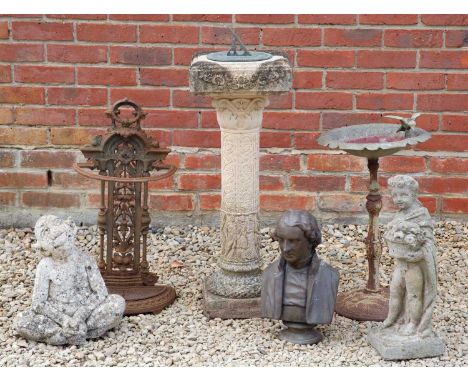 A small mixed group of garden ornaments to include a small metal bird bath with flower head cast bowl, 56cm high; a small rec