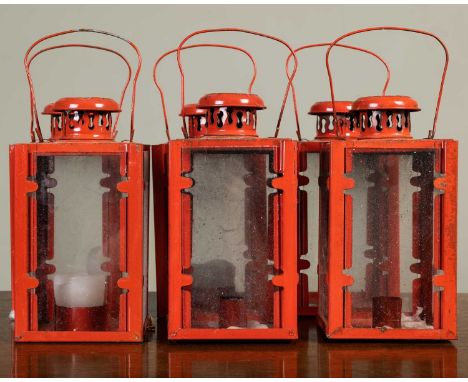 A set of six metal lanterns with orange enamel colouring, 24cm high including swing handle (6)Overall dirt, dust, marks, wear