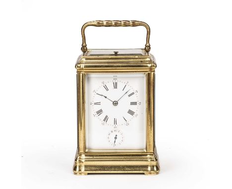 A 19th century French brass carriage clock, the white enamel Roman dial with Arabic five minutes and subsidiary alarm dial, t