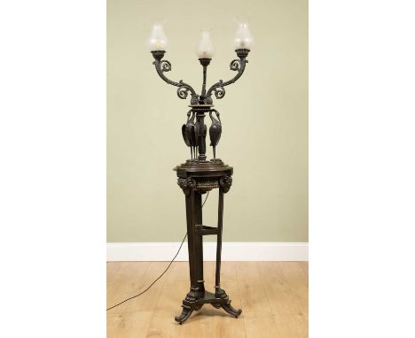 A late Regency Messenger &amp; Sons floor standing lamp or torchère in the Roman style with three scrolling branches supporte