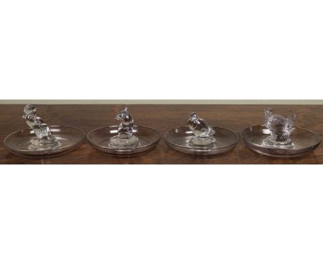 Rene Lalique, four pin dishes, Souris, Canard, Dindon and Moineau, each signed beneath 'R. Lalique' and 11.5cm diameter. (4)A
