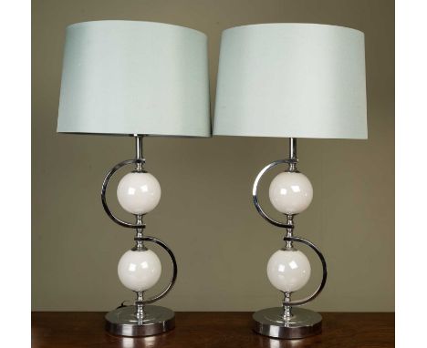 A pair of chrome and glass decorative table lamps with light blue shades, each lamp 50cm high to the light fitting, 68cm high