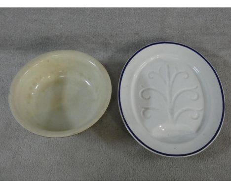 A vintage ceramic washbowl with wisteria, bird and lantern design and orange band top and bottom along with a white ceramic o