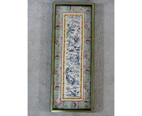 A 19th century Chinese framed and glazed silk panel, figures in a landscape within a floral woven border. H.64xW.25cm 