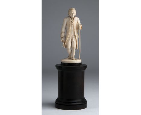 “Jean Jacques Rousseau". A carved ivory figure - France, 19th Century; ; on a wooden base. 18.4 cm, 7 1/4 in high overall, ba