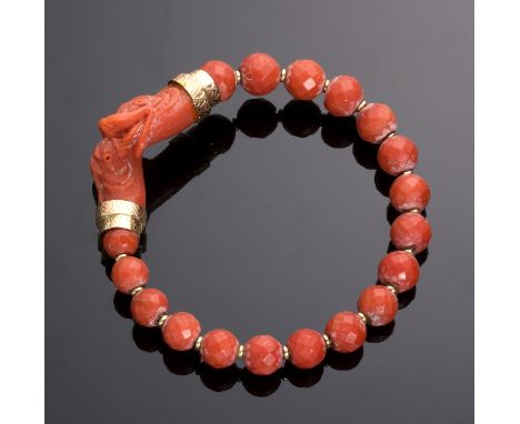 A red coral bangle bracelet with 18 faceted boulles, two dolphin heads and gold elements - Trapani (Italy), 18th Century; ; b