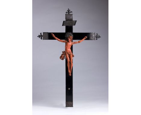 A carved coral Crucifix  - Trapani (Italy), late 17th Century; ; on a later wooden cross. 41 cm, 16 9?64 in high overall - 26