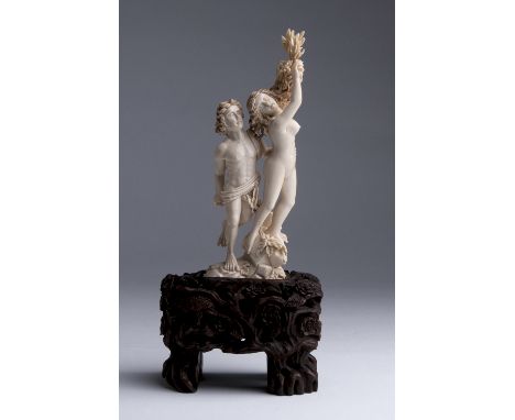 "Apollo & Daphne". A carved ivory figural group - J. Wells, France / Belgium, 19th Century; ; signed J. Wells, on a wooden ba