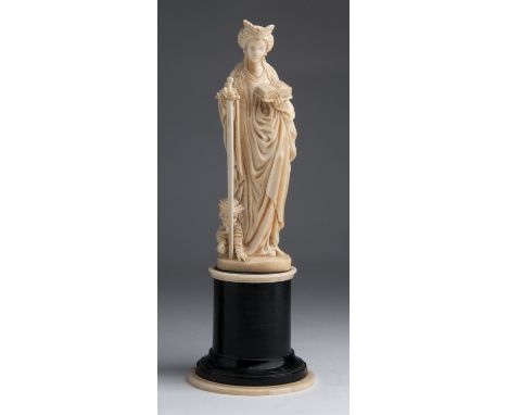 A carved ivory female figure -  Germany / Holland,  19th Century; ; on a wood and ivory base. 27.3 cm, 10 3/4 in high overall