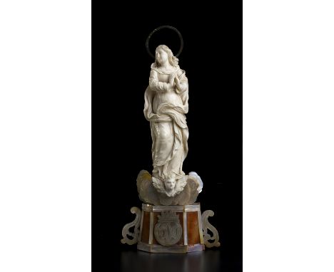 "The Immaculate Virgin". A carved ivory figure  -  Bottega dei Tipa, Trapani (Italy), 18th Century; ; standing on a mother of