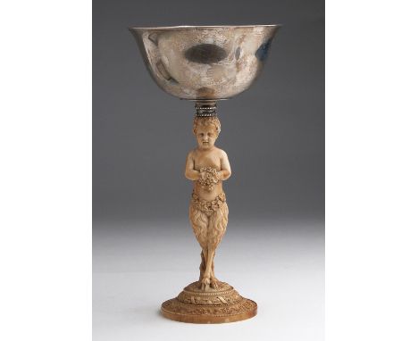 A silver cup with a carved ivory support depicting a Satyr - Germany, late 19th Century; ; unmarked. 25.2 cm, 9 59/64 in high