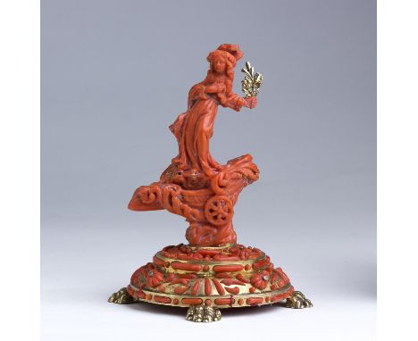 "Saint Rosalie".  A carved coral figure  -  Trapani (Italy),  late 17th Century; ; represented on a carriage with a lilly in 