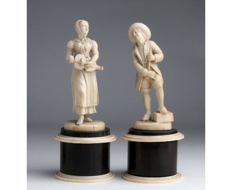 A pair of carved ivory figures of street musicians -  Germany, 19th Century; ; on ivory and wooden base. 22.1 cm, 8 45/64 in 