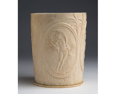 "The Four Seasons". A carved ivory vase -  Colonial India, late 19th; ; 14.5 cm, 5 45/64 in high, base diameter 10 cm, 3 15/1