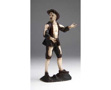 A carved ivory and lime wood figure of a beggar -  Lucerne, late 18th Century; ; on a wooden base. 22.7 cm, 8 15?16 in high o