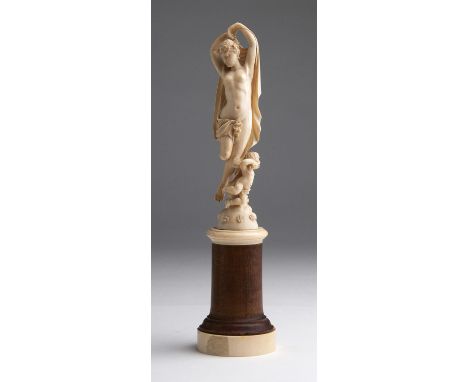 A carved ivory allegorical female figure - France,  late 19th Century; ; on a ivory and wood base. 24.5 cm, 9 41/64 in high o